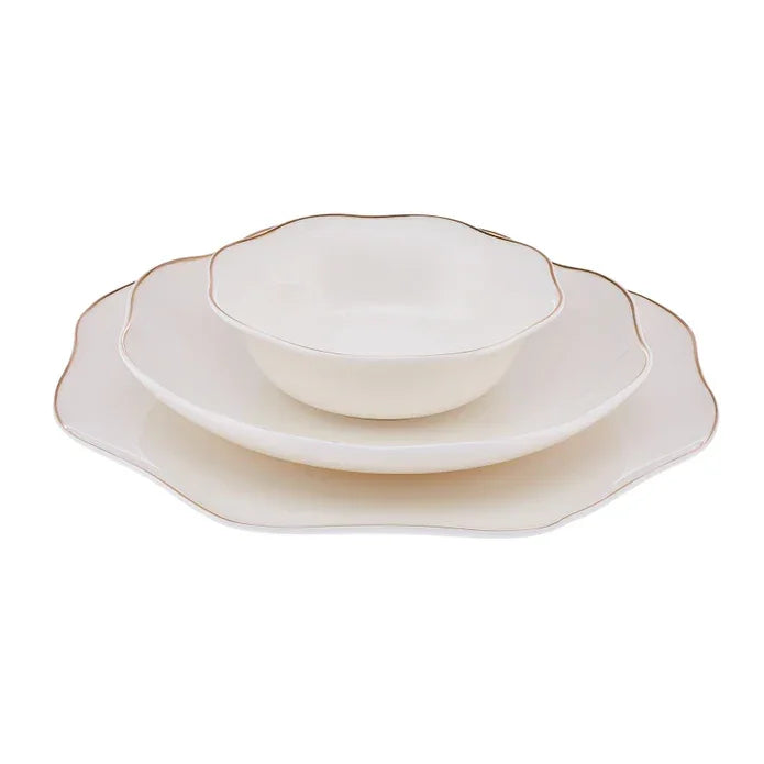 Elegant white ceramic dinner set with scalloped edges and gold trim by Emsan Jordan